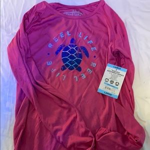 reel life hot pink shirt.